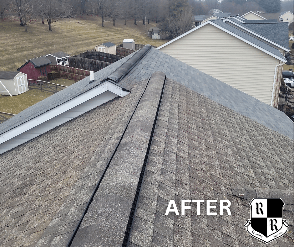 Rooftop with red shingles and a dark repair patch in the center, a wooden square patch nearby, two green vent caps, and a company logo in the bottom-left corner.